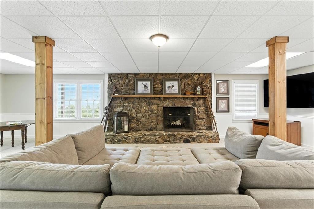 11 Brow Road Rome, GA 30165 - Photo 22 of 39 a living room with furniture and a fireplace
