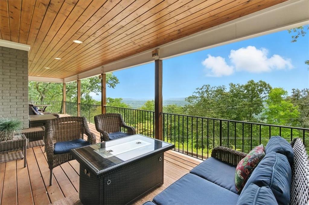 11 Brow Road Rome, GA 30165 - Photo 34 of 39 a view of a patio with couches chairs and wooden floor