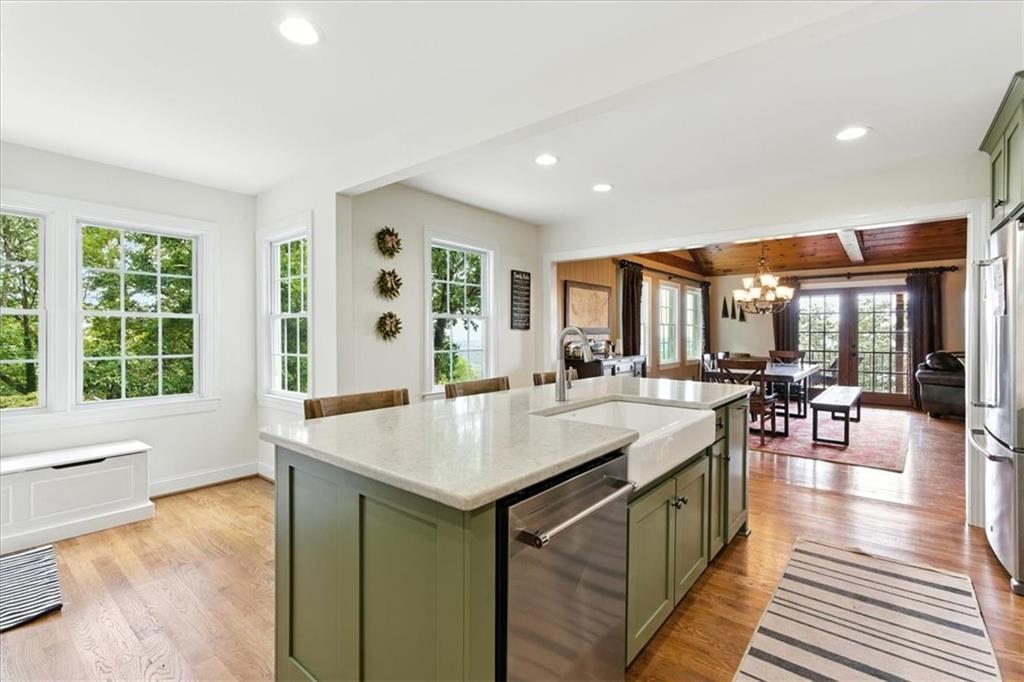 11 Brow Road Rome, GA 30165 - Photo 7 of 39 a view of kitchen island with furniture and wooden floor