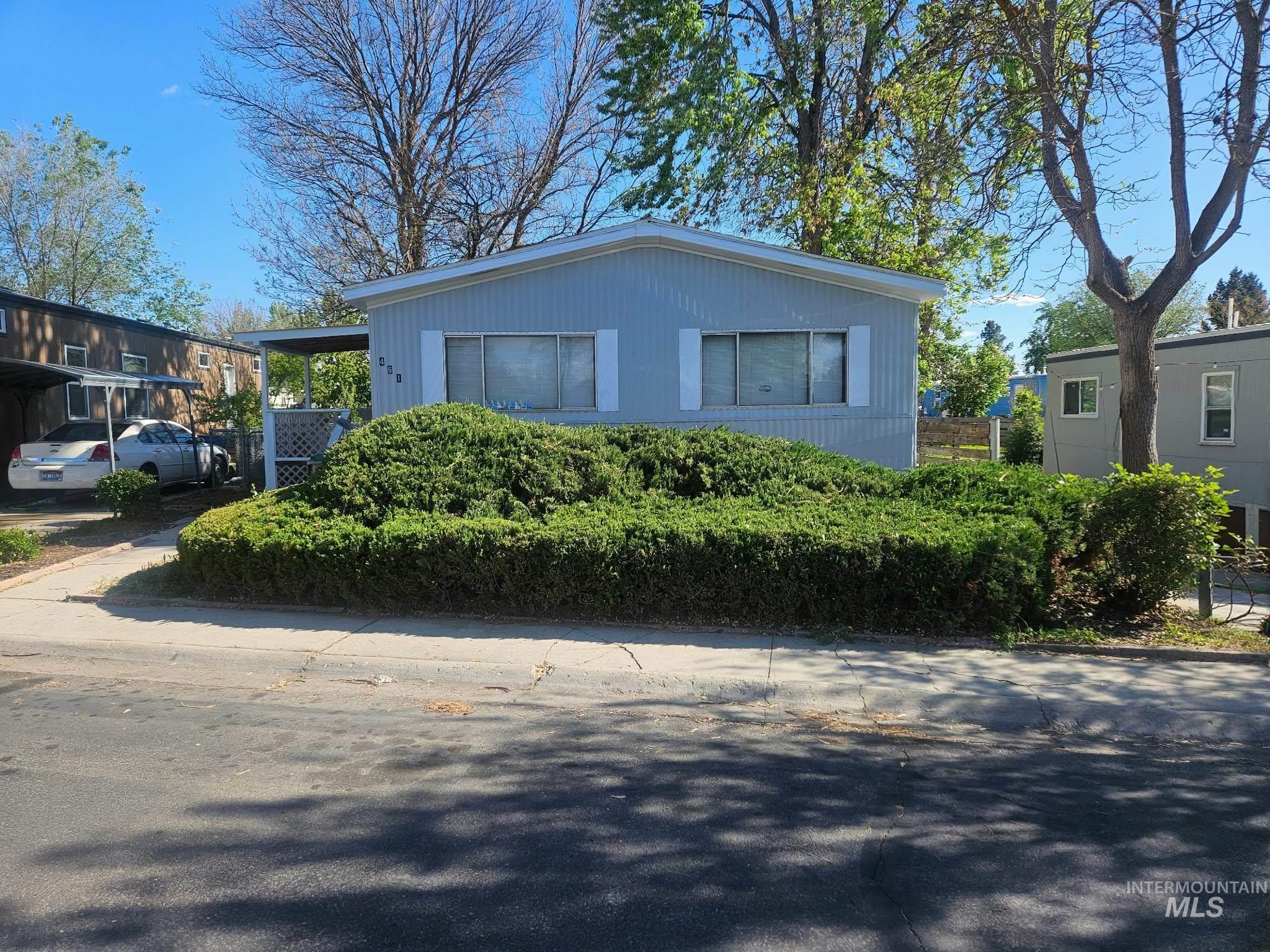 461 Greenleaf Street Boise, ID 83713 - Photo 1 of 19 Light blue exterior with white trim details
