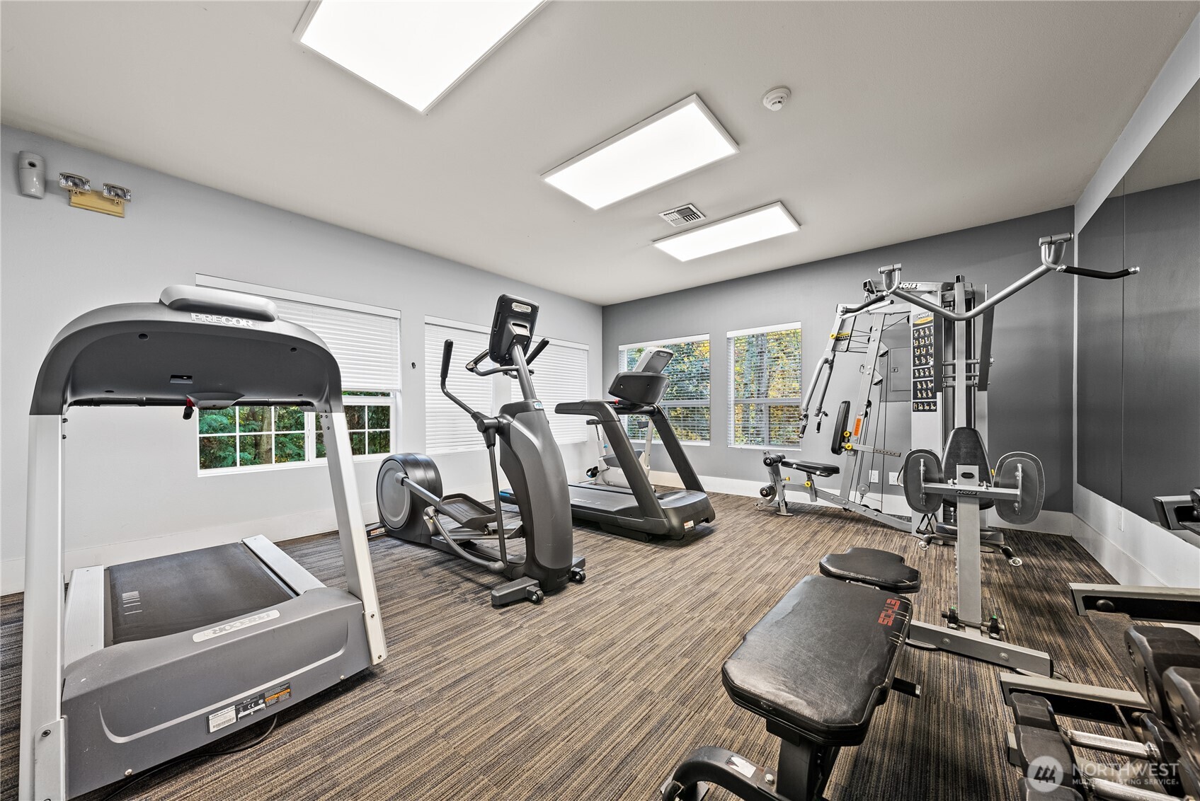 18930 Bothell Everett Highway, Unit G103 Bothell, WA 98012 - Photo 18 of 25 a view of a room with gym equipment