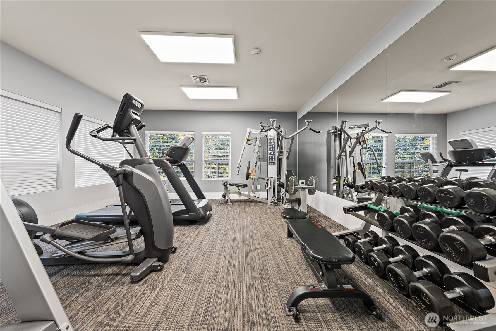 18930 Bothell Everett Highway, Unit G103 Bothell, WA 98012 - Photo 19 of 25 a view of a room with gym equipment