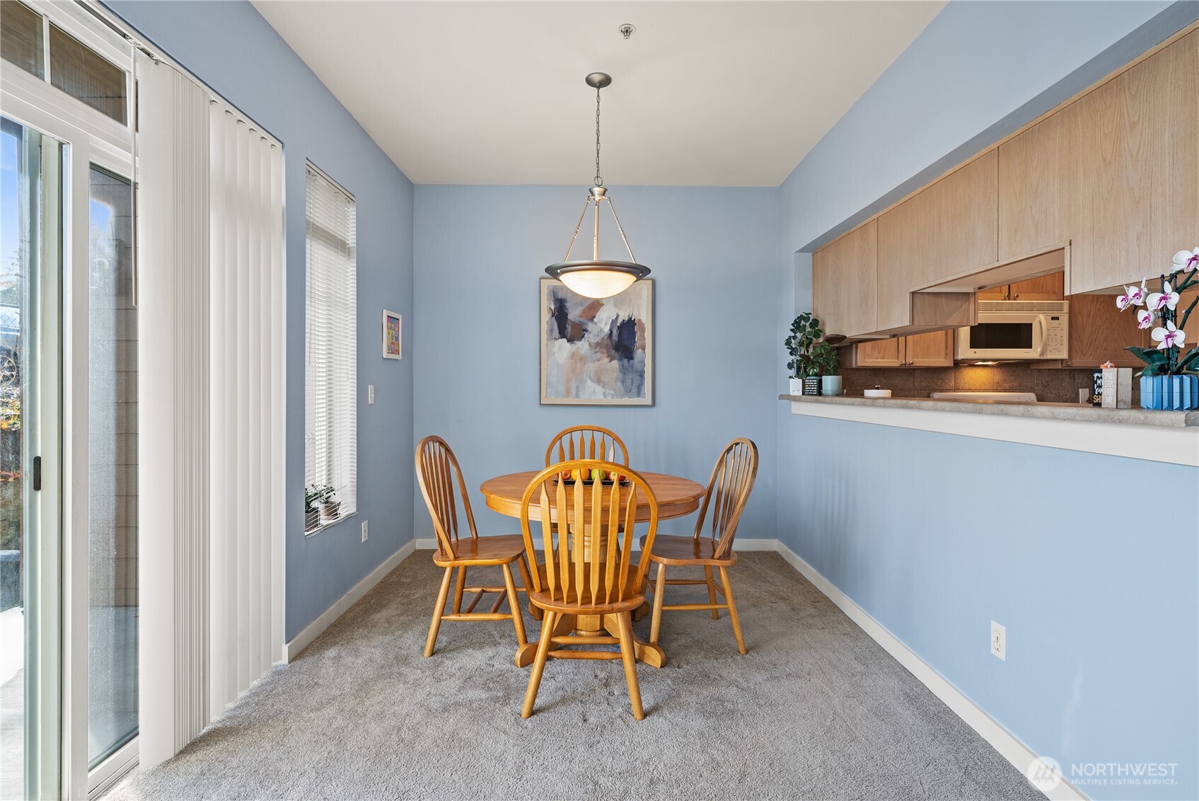 18930 Bothell Everett Highway, Unit G103 Bothell, WA 98012 - Photo 7 of 25 a dining room with furniture and window