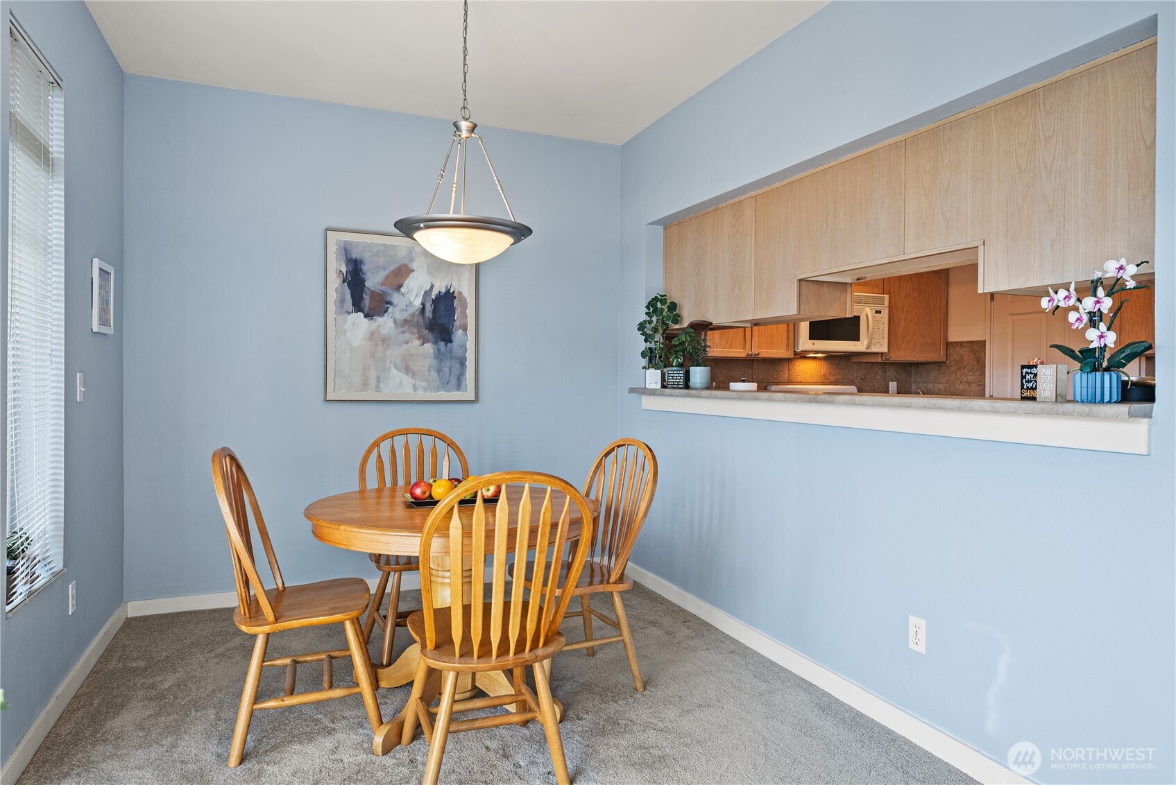 18930 Bothell Everett Highway, Unit G103 Bothell, WA 98012 - Photo 8 of 25 a dining room with furniture and window