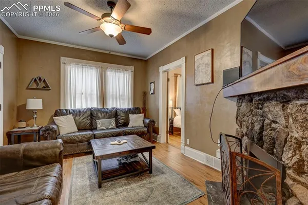 a living room with furniture and a window