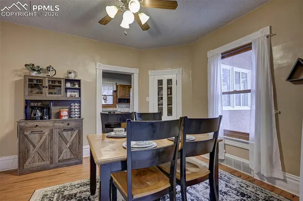a view of a dining room with furniture