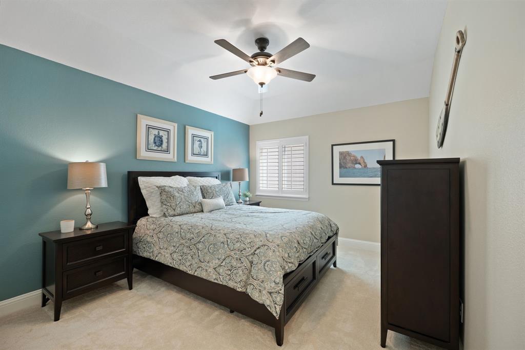 738 East Main Street Coppell, TX 75019 - Photo 17 of 27 a bedroom with a bed and window