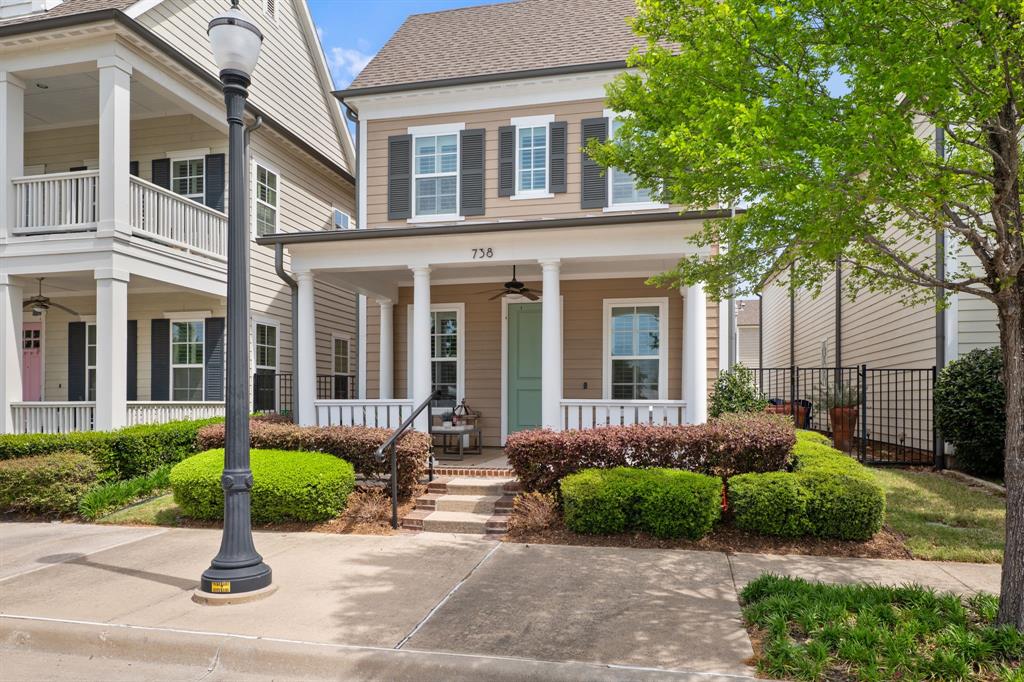 738 East Main Street Coppell, TX 75019 - Photo 2 of 27 a front view of a house with garden