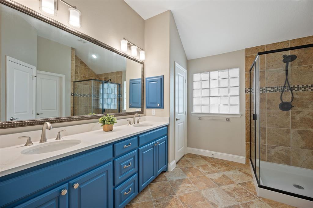 738 East Main Street Coppell, TX 75019 - Photo 23 of 27 a bathroom with a double vanity sink mirror double and shower
