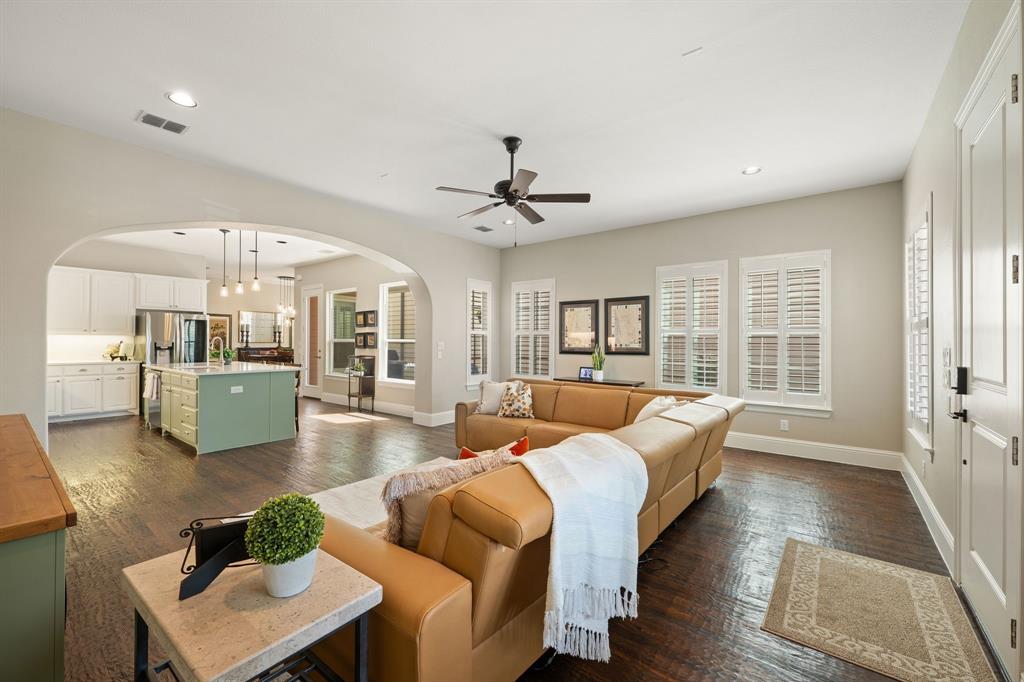 738 East Main Street Coppell, TX 75019 - Photo 5 of 27 a living room with furniture and a large window