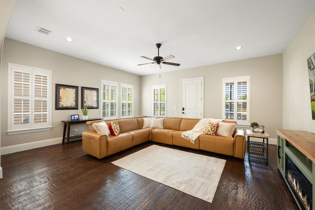 738 East Main Street Coppell, TX 75019 - Photo 6 of 27 a living room with furniture and a large window