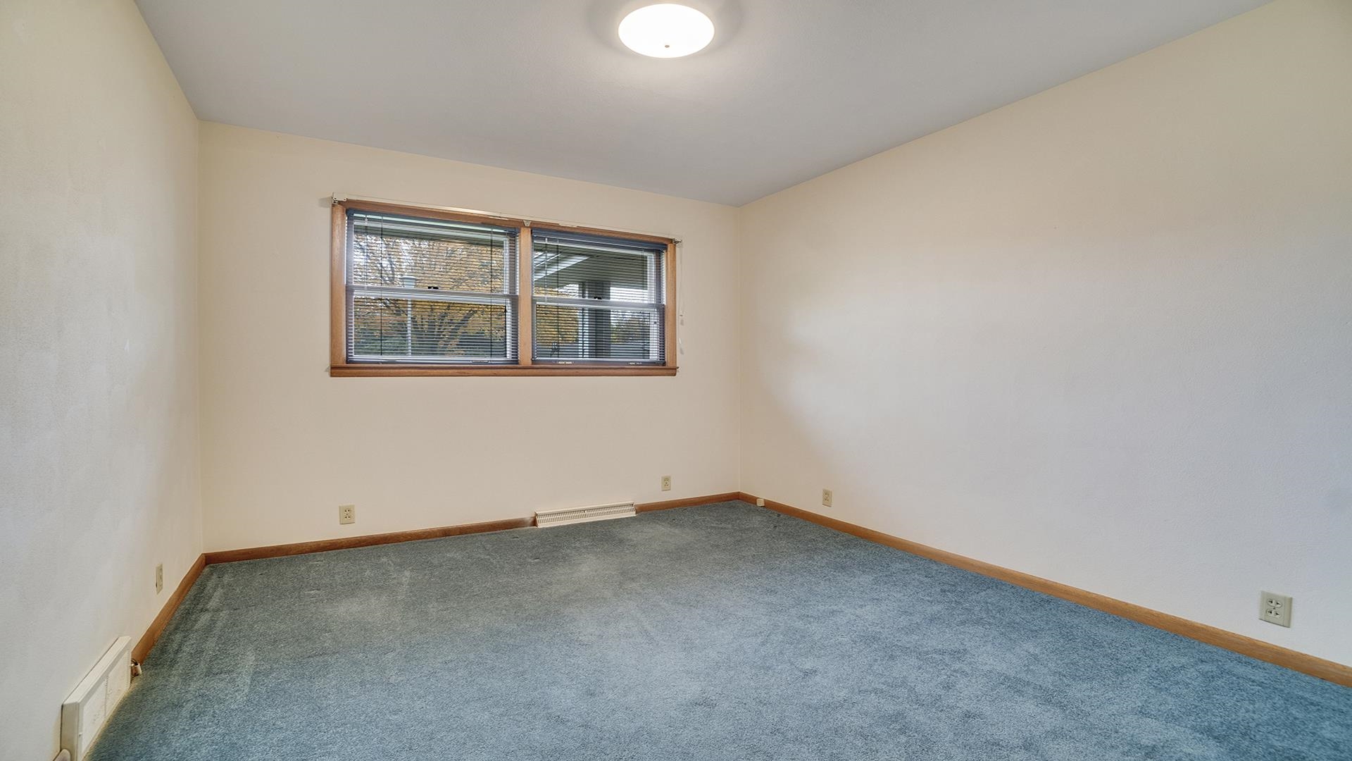1405 Crest Lane Rochelle, IL 61068 - Photo 22 of 30 an empty room with a window