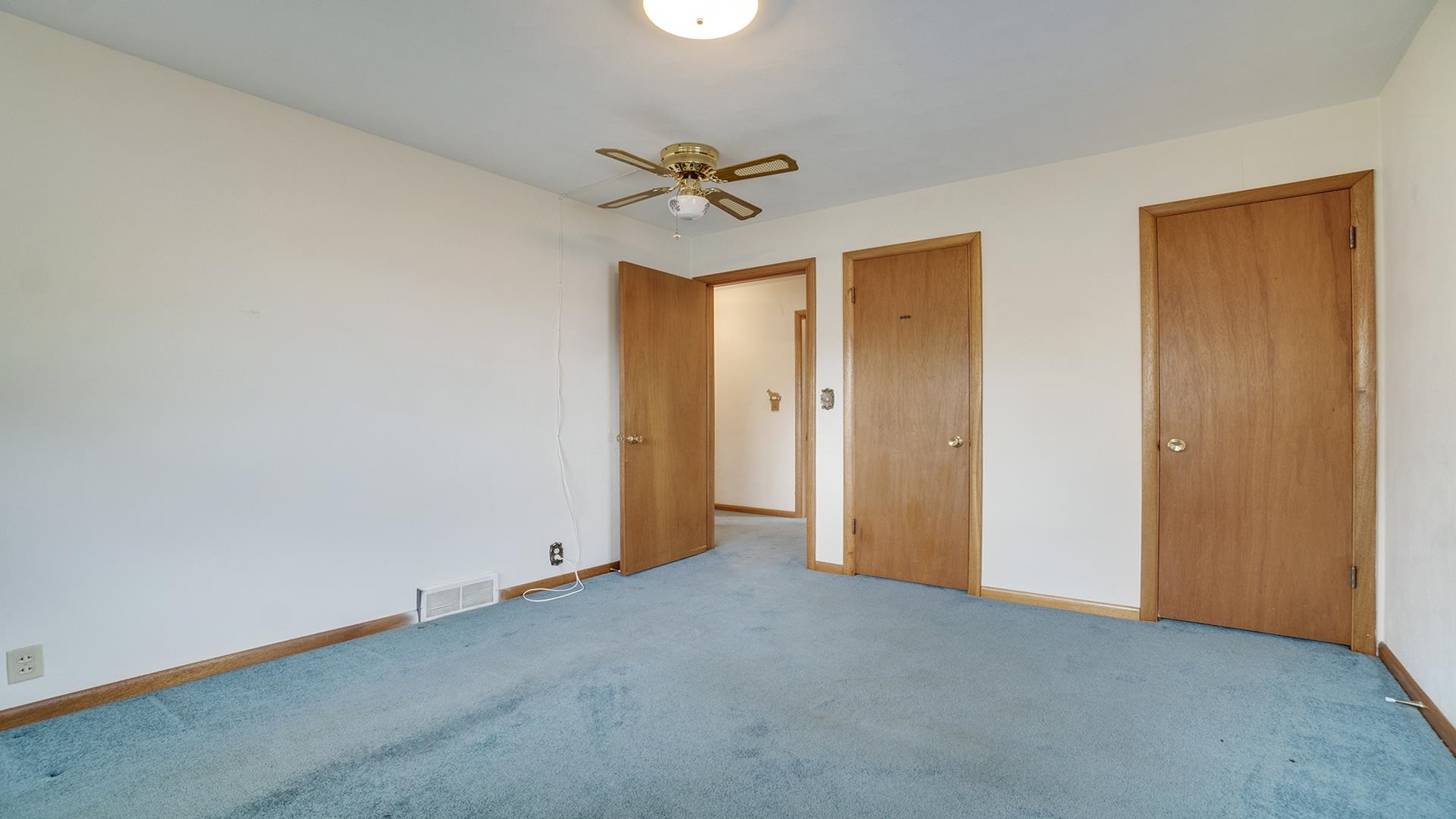 1405 Crest Lane Rochelle, IL 61068 - Photo 25 of 30 a view of a livingroom with a ceiling fan