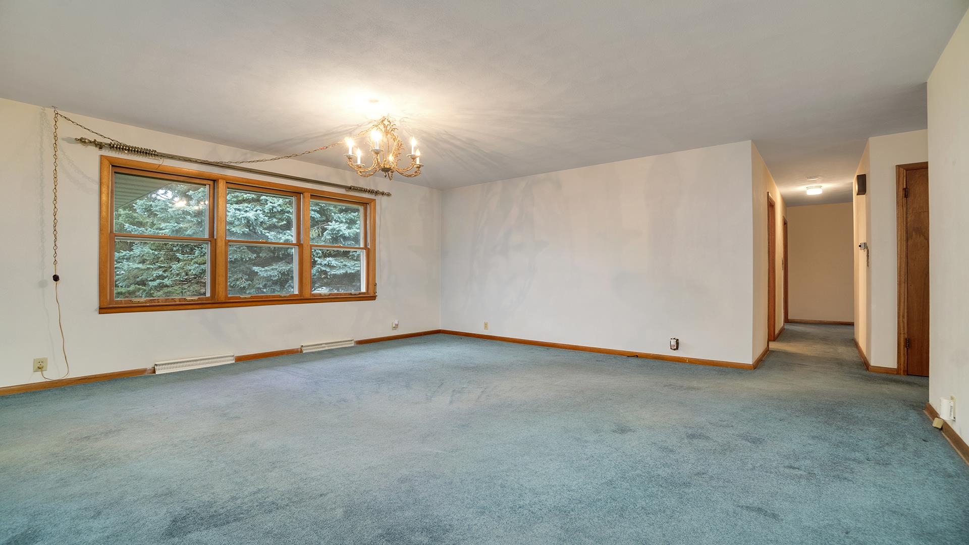 1405 Crest Lane Rochelle, IL 61068 - Photo 6 of 30 an empty room with windows