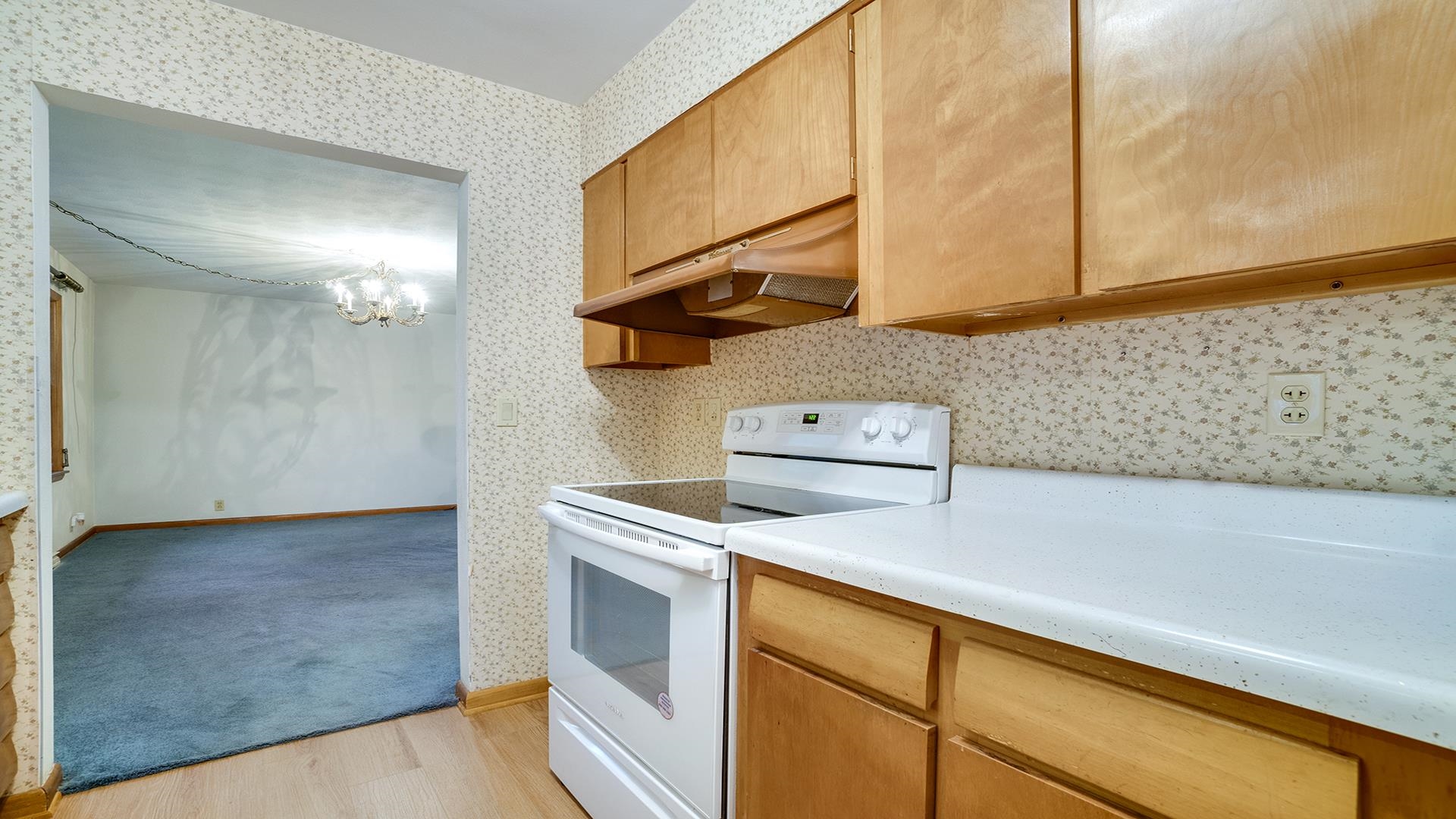 1405 Crest Lane Rochelle, IL 61068 - Photo 9 of 30 a kitchen with a stove and a microwave