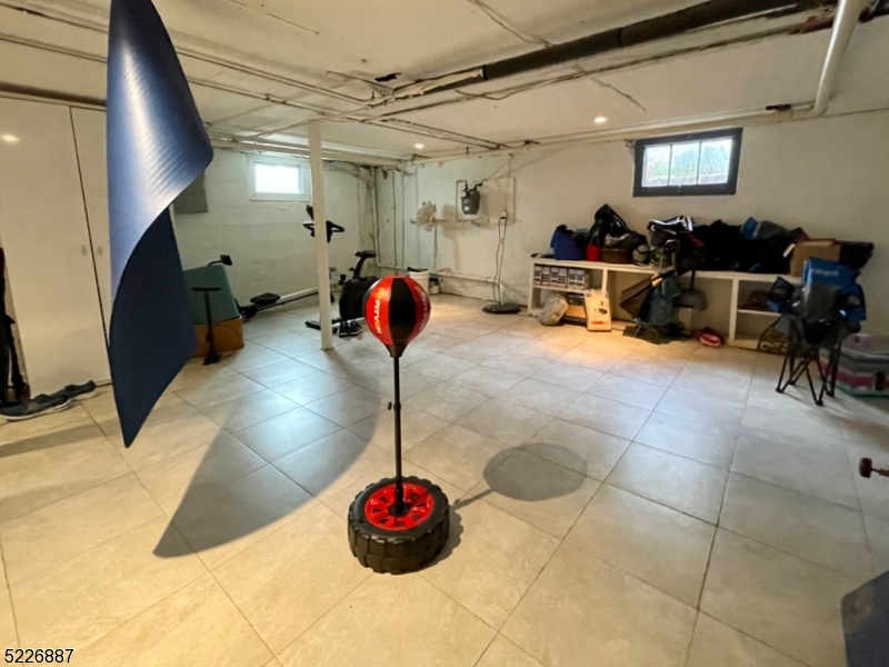 19 Valley Road Montclair, NJ 07042 - Photo 11 of 22 a view of a lobby with a chandelier and couch