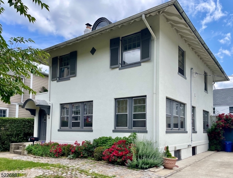 19 Valley Road Montclair, NJ 07042 - Photo 21 of 22 a front view of a house with yard