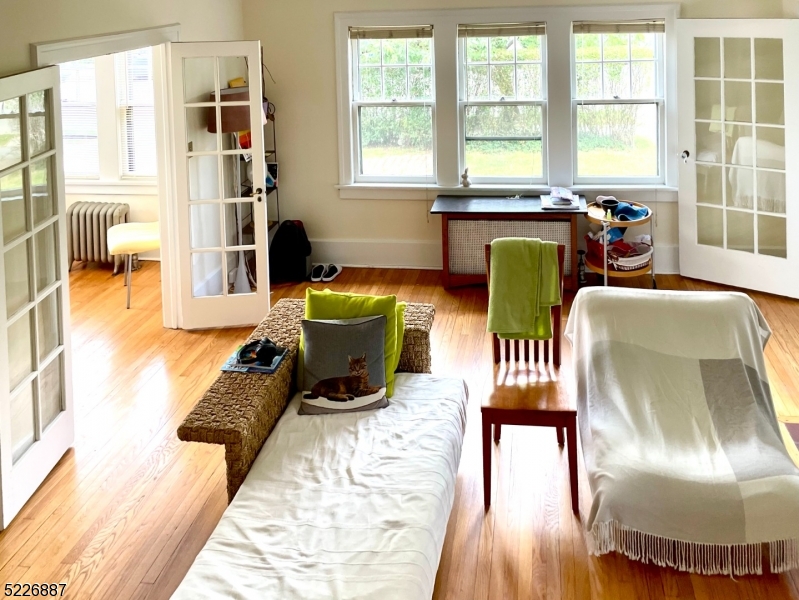19 Valley Road Montclair, NJ 07042 - Photo 4 of 22 a living room with furniture and a window