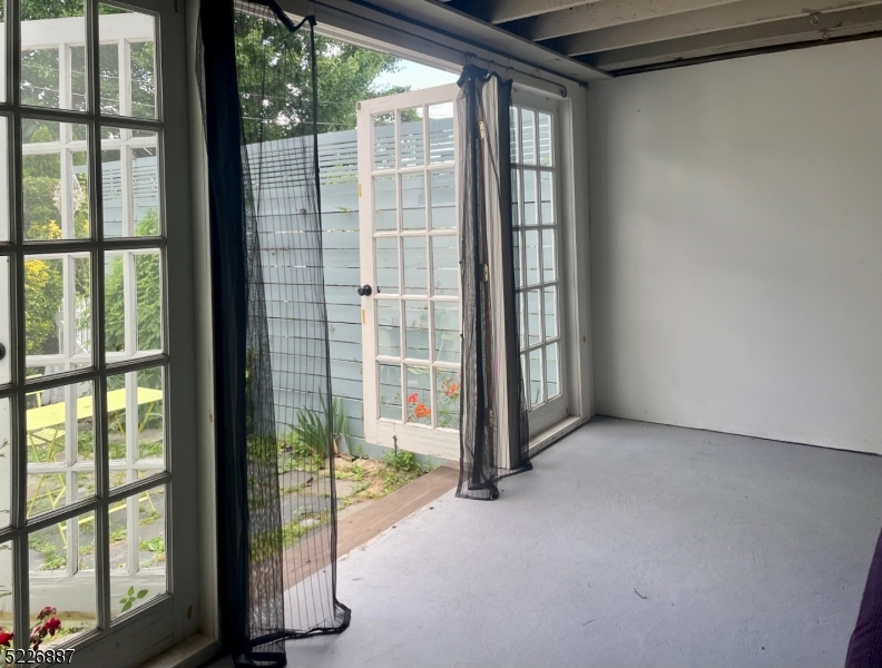 19 Valley Road Montclair, NJ 07042 - Photo 8 of 22 a view of a room with large windows
