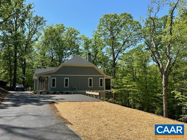 329 Carrsbrook Drive Charlottesville, VA 22901 - Photo 11 of 75 a front view of a house with a yard