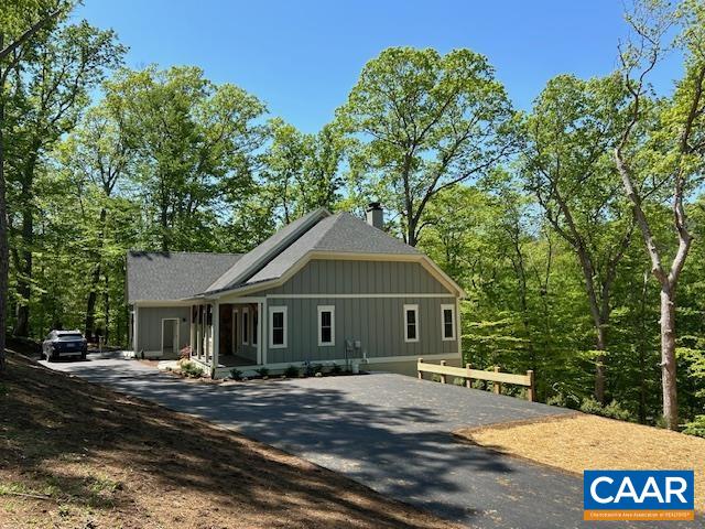 329 Carrsbrook Drive Charlottesville, VA 22901 - Photo 12 of 75 a front view of a house with a garden