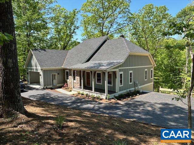 329 Carrsbrook Drive Charlottesville, VA 22901 - Photo 2 of 75 a yellow house with trees in front of it