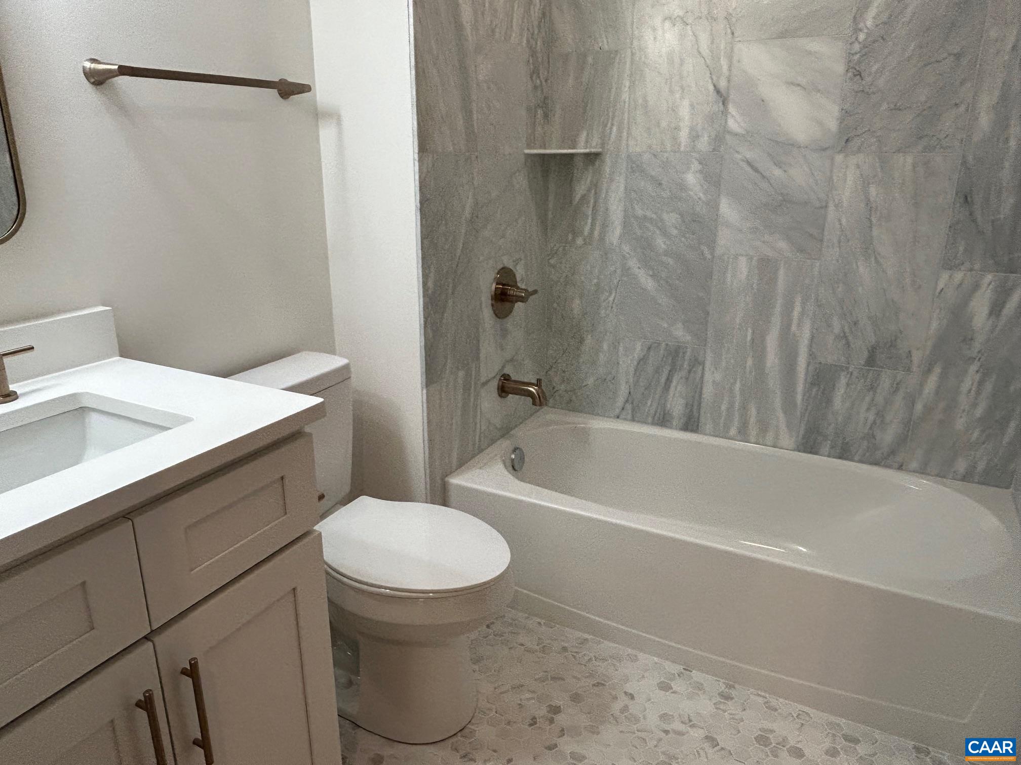 329 Carrsbrook Drive Charlottesville, VA 22901 - Photo 36 of 75 a bathroom with a sink a toilet and a bathtub