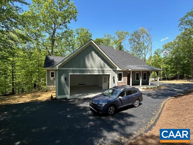 329 Carrsbrook Drive Charlottesville, VA 22901 - Photo 5 of 75 a front view of a house with a yard