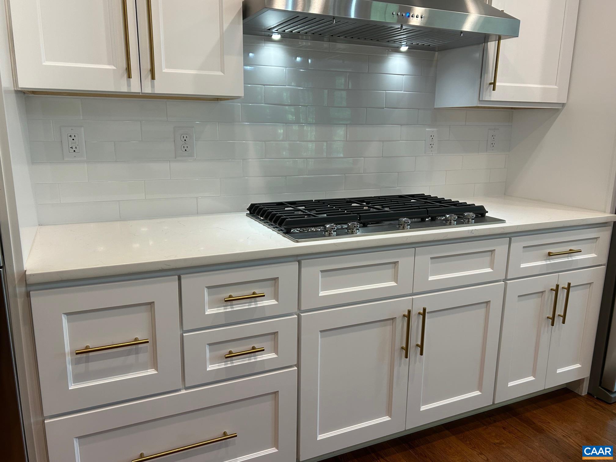 329 Carrsbrook Drive Charlottesville, VA 22901 - Photo 52 of 75 a stove top oven sitting inside of a kitchen