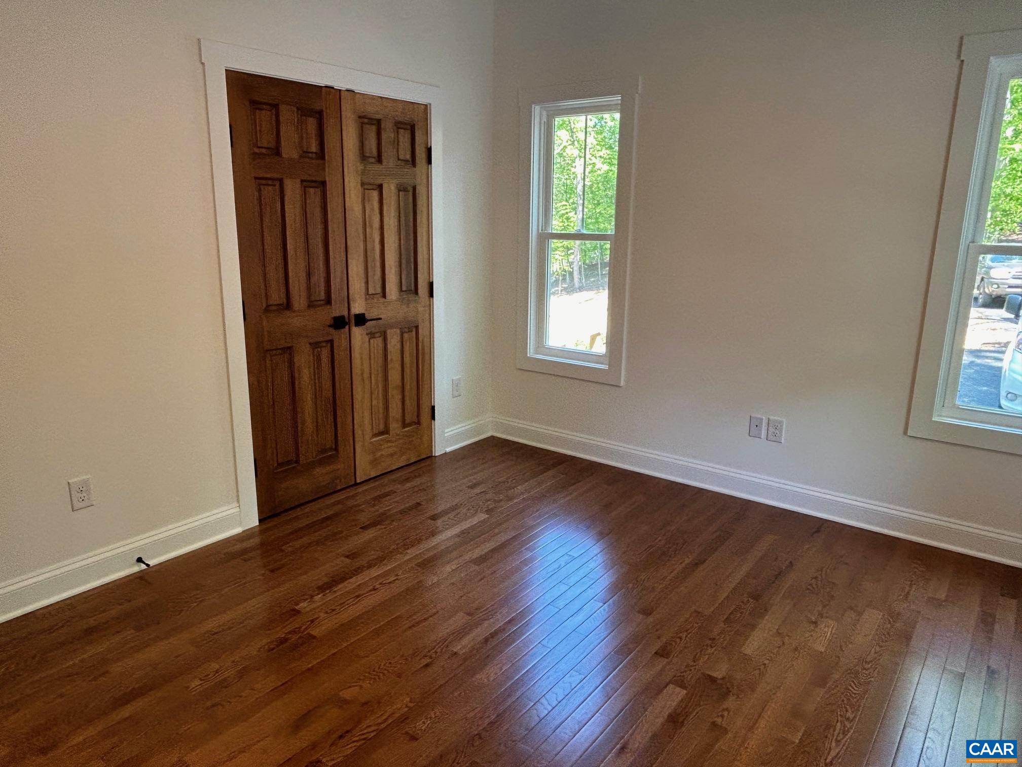 329 Carrsbrook Drive Charlottesville, VA 22901 - Photo 70 of 75 an empty room with wooden floor closet and windows