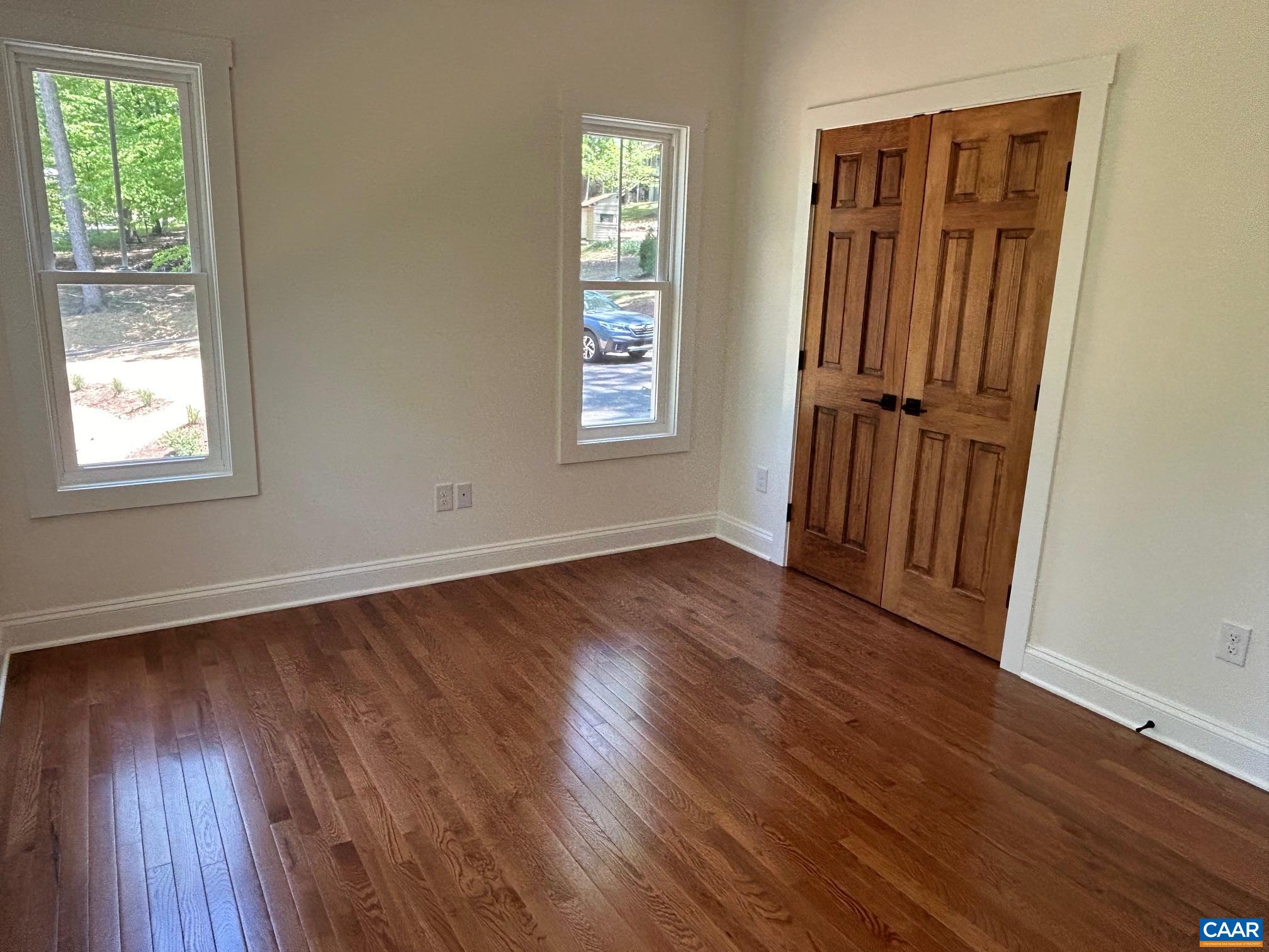 329 Carrsbrook Drive Charlottesville, VA 22901 - Photo 72 of 75 an empty room with wooden floor closet and windows