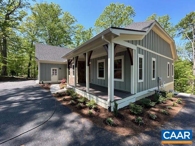 329 Carrsbrook Drive Charlottesville, VA 22901 - Photo 8 of 75 a view of a house with a yard