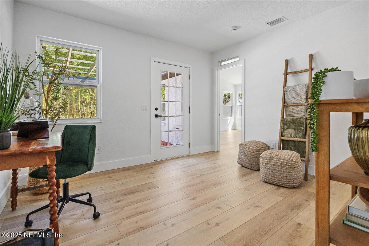 1435 Flanders Road Jacksonville, FL 32207 - Photo 12 of 21 a workspace with furniture and a window