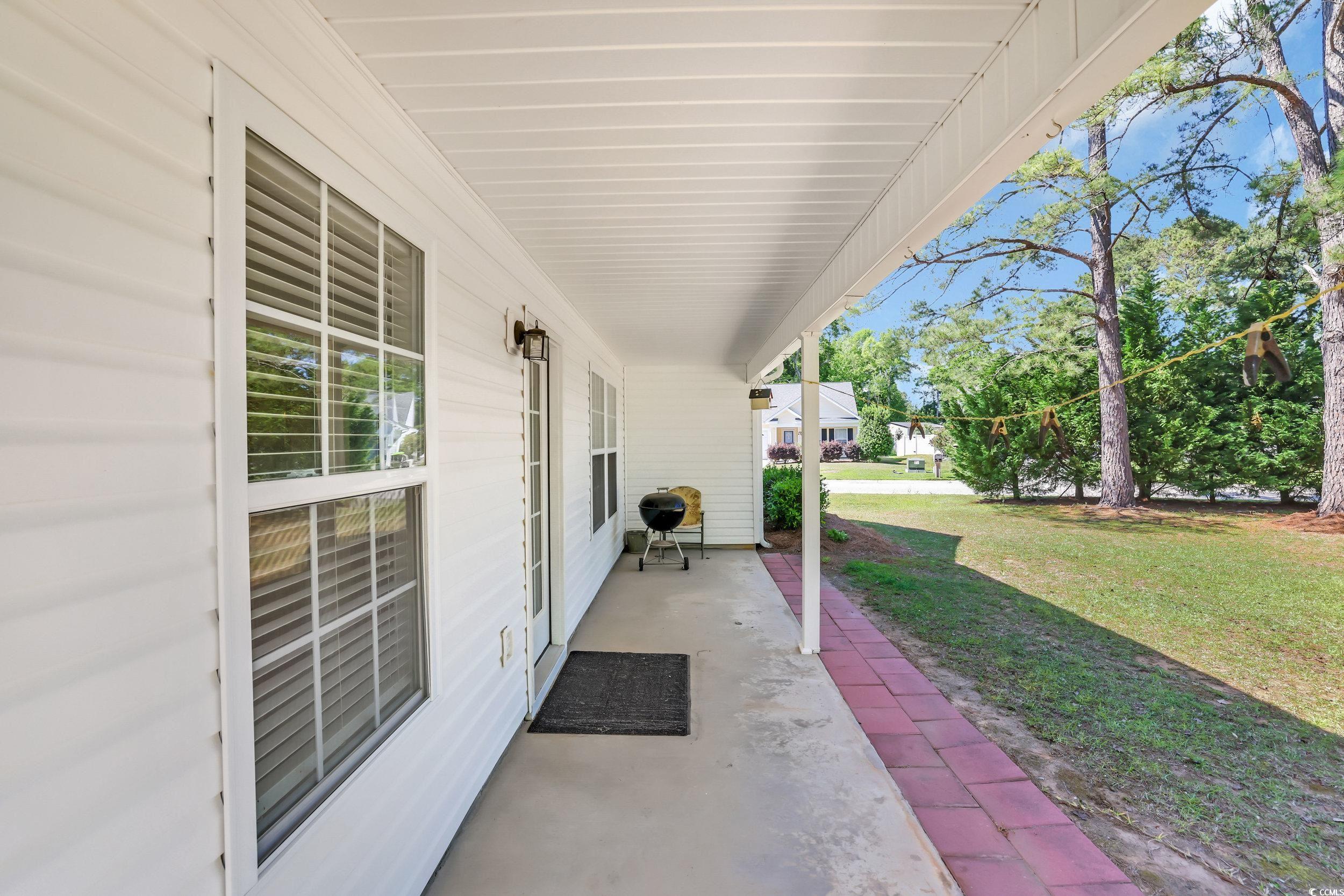 244 Devonbrook Place Longs, SC 29568 - Photo 31 of 40 View of patio with covered porch