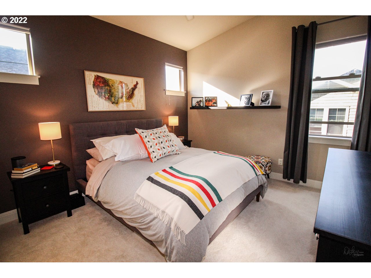 14174 Southwest Compass Drive Beaverton, OR 97005 - Photo 16 of 32 a bedroom with a bed and a painting on the wall