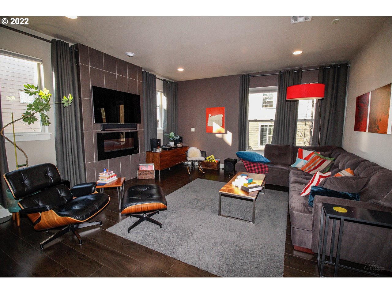 14174 Southwest Compass Drive Beaverton, OR 97005 - Photo 6 of 32 a living room with furniture and a flat screen tv