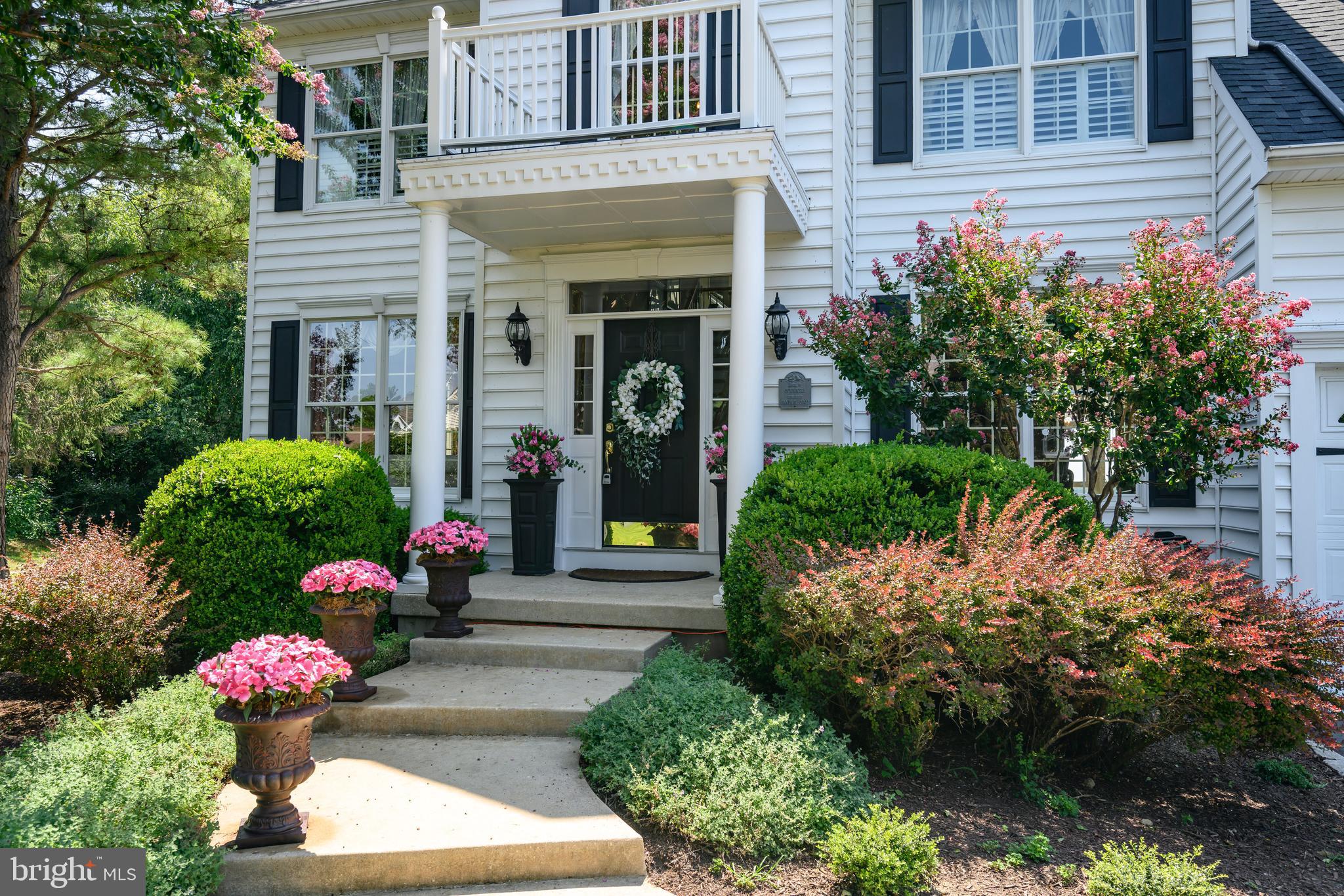 21477 Island Club Road Tilghman, MD 21671 - Photo 16 of 50 a front view of a house with a yard