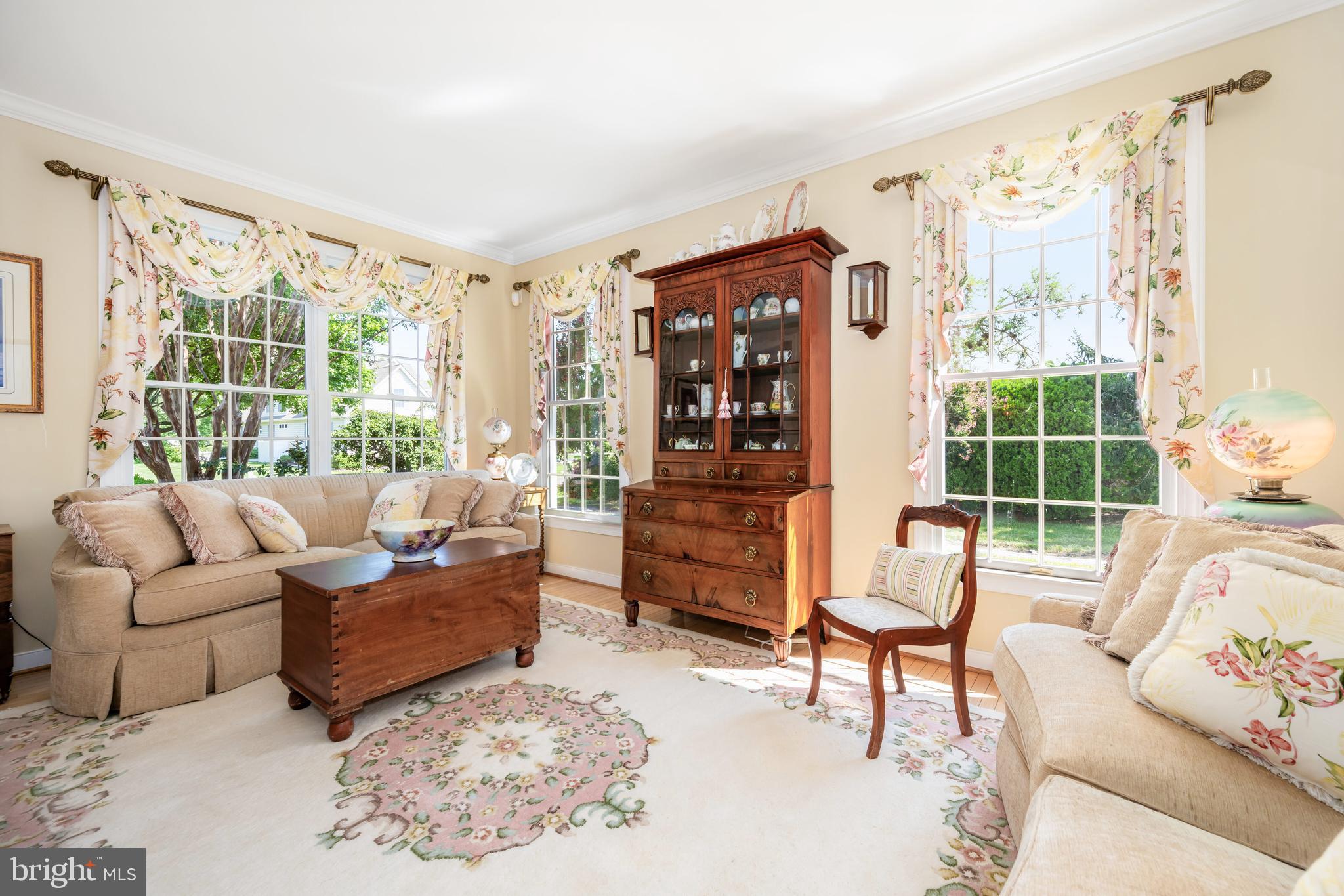 21477 Island Club Road Tilghman, MD 21671 - Photo 21 of 50 a living room with furniture and a large window