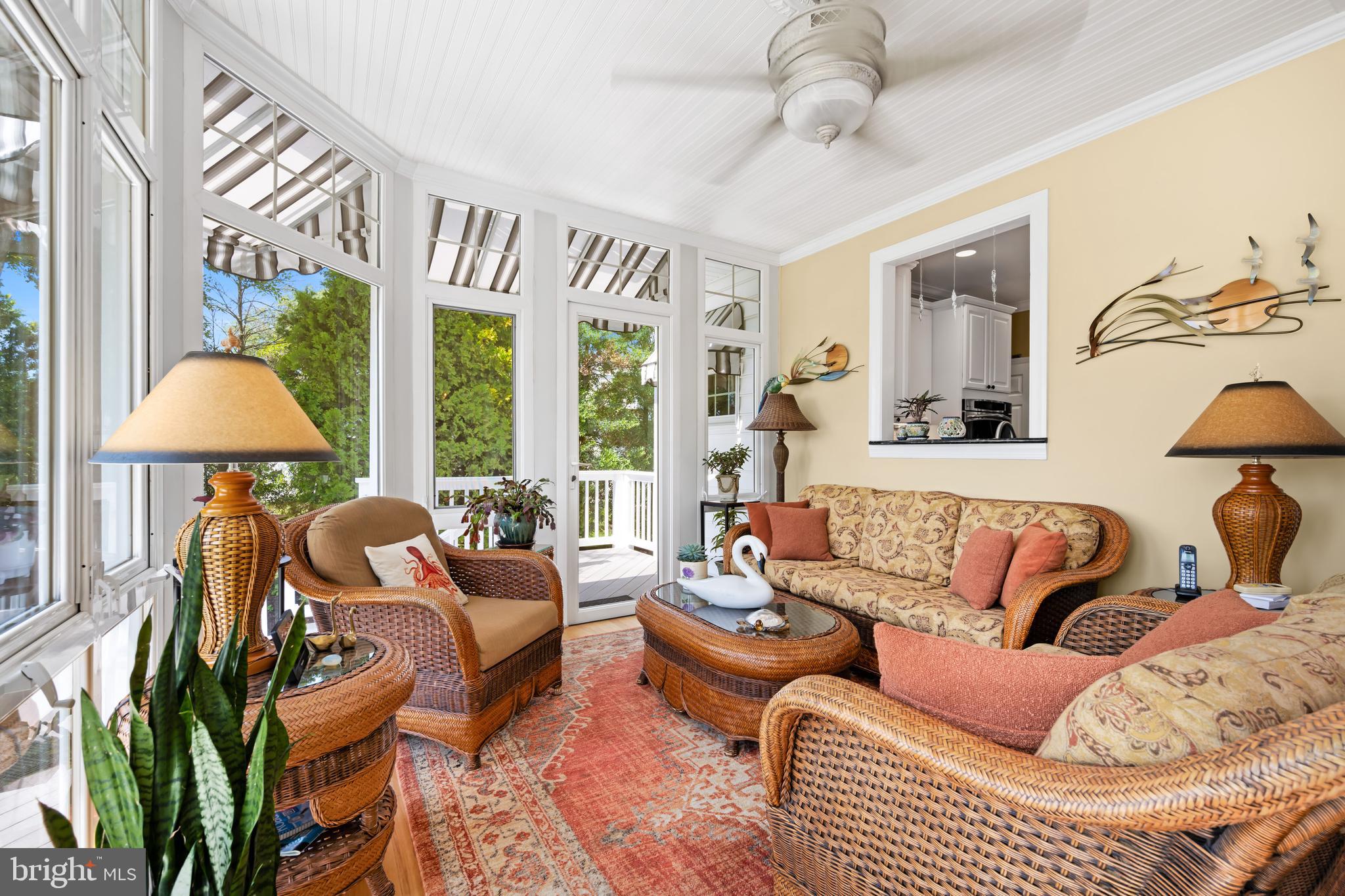 21477 Island Club Road Tilghman, MD 21671 - Photo 29 of 50 a living room with furniture and a large window
