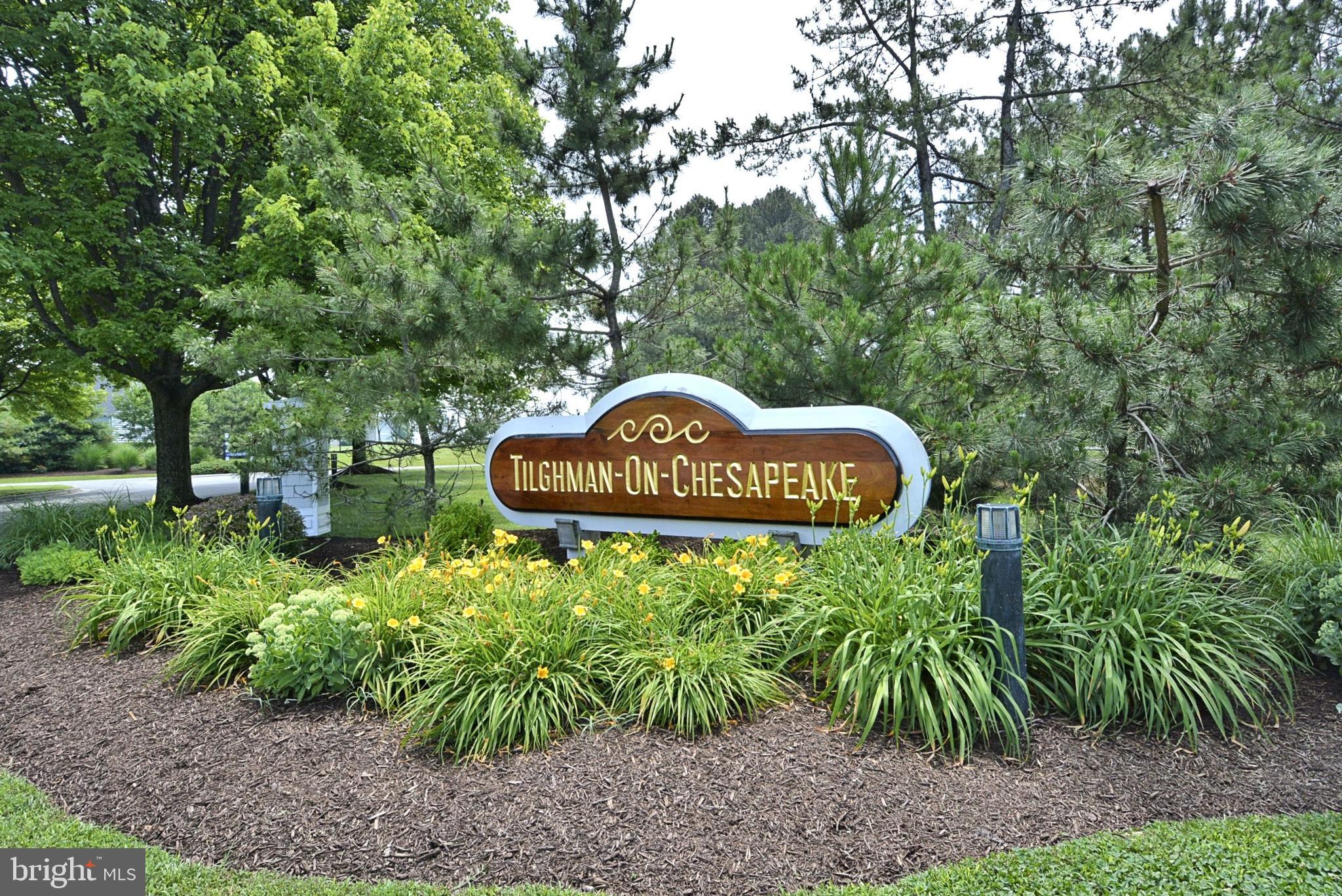 21477 Island Club Road Tilghman, MD 21671 - Photo 3 of 50 a sign that is sitting in the middle of a yard