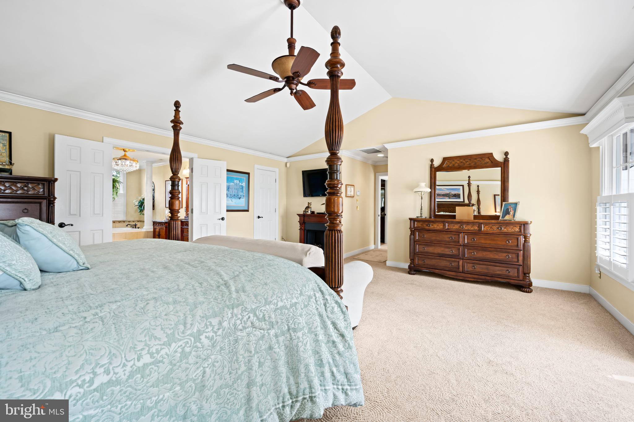 21477 Island Club Road Tilghman, MD 21671 - Photo 41 of 50 a bed room with a bed and dresser