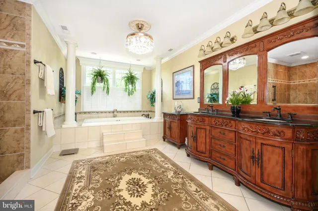 a bathroom with a bathtub and a sink