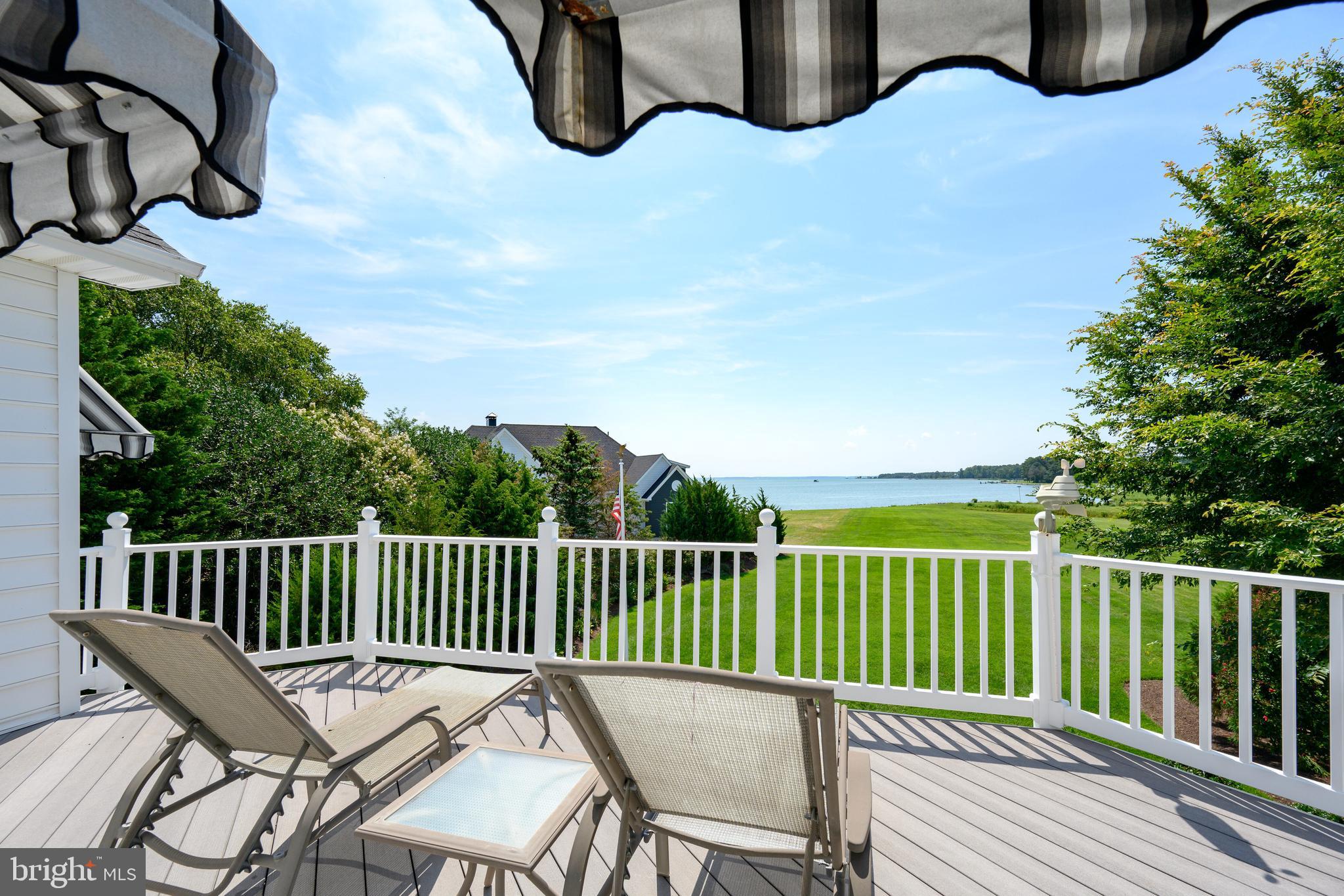 21477 Island Club Road Tilghman, MD 21671 - Photo 45 of 50 a view of a chair and table in the balcony