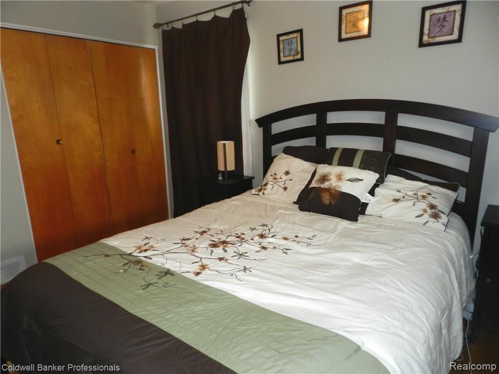 17940 Winsome Road Fraser, MI 48026 - Photo 13 of 24 Master bedroom with hardwood floors and large closet.