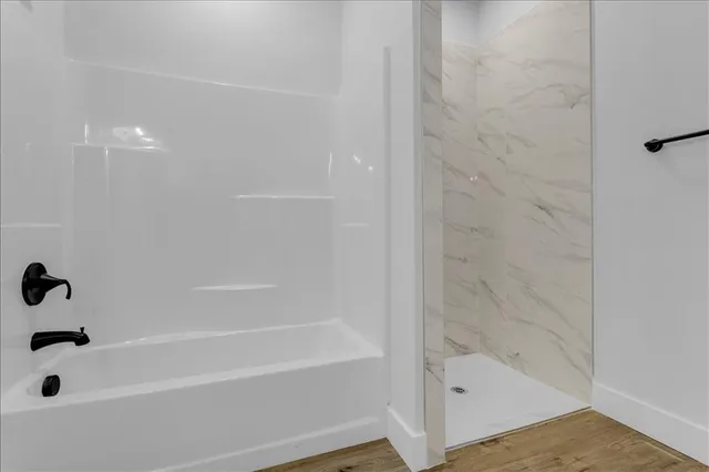 a bathroom with a bathtub