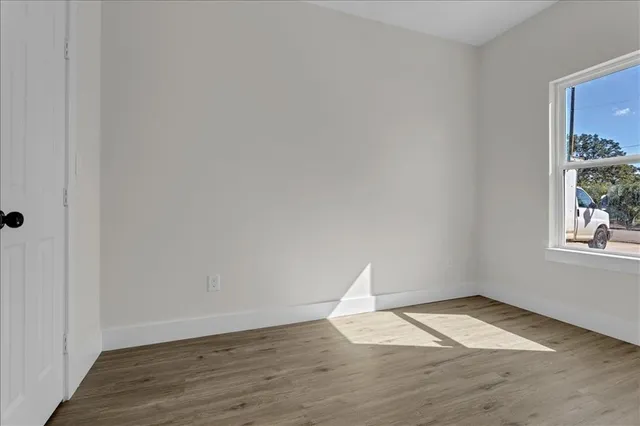 a view of a kitchen with electric appliances
