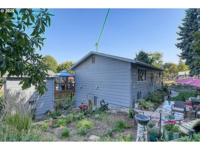 a backyard of a house with lots of green space