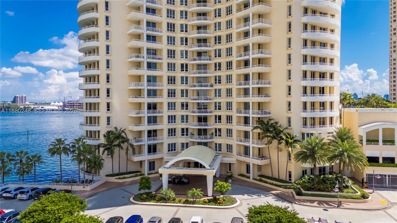 888 Brickell Key Drive, Unit 1807 Miami, FL 33131 - Photo 35 of 58 a building view with a garden space
