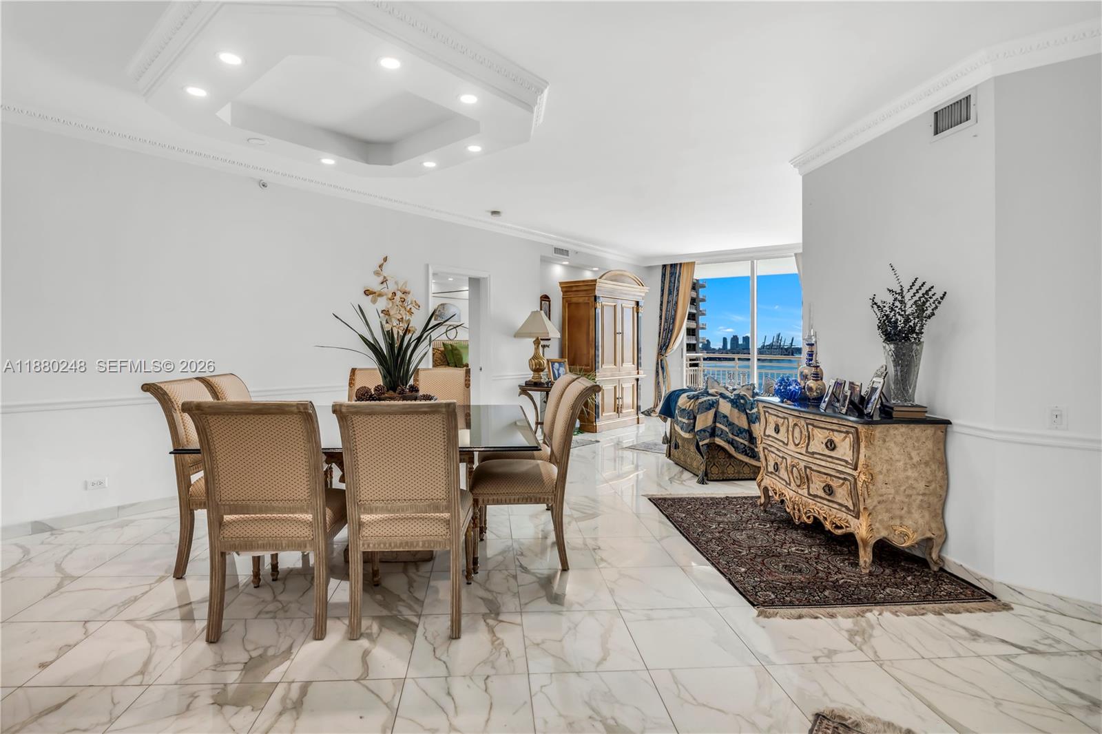 888 Brickell Key Drive, Unit 1807 Miami, FL 33131 - Photo 5 of 58 a view of a dining room with furniture