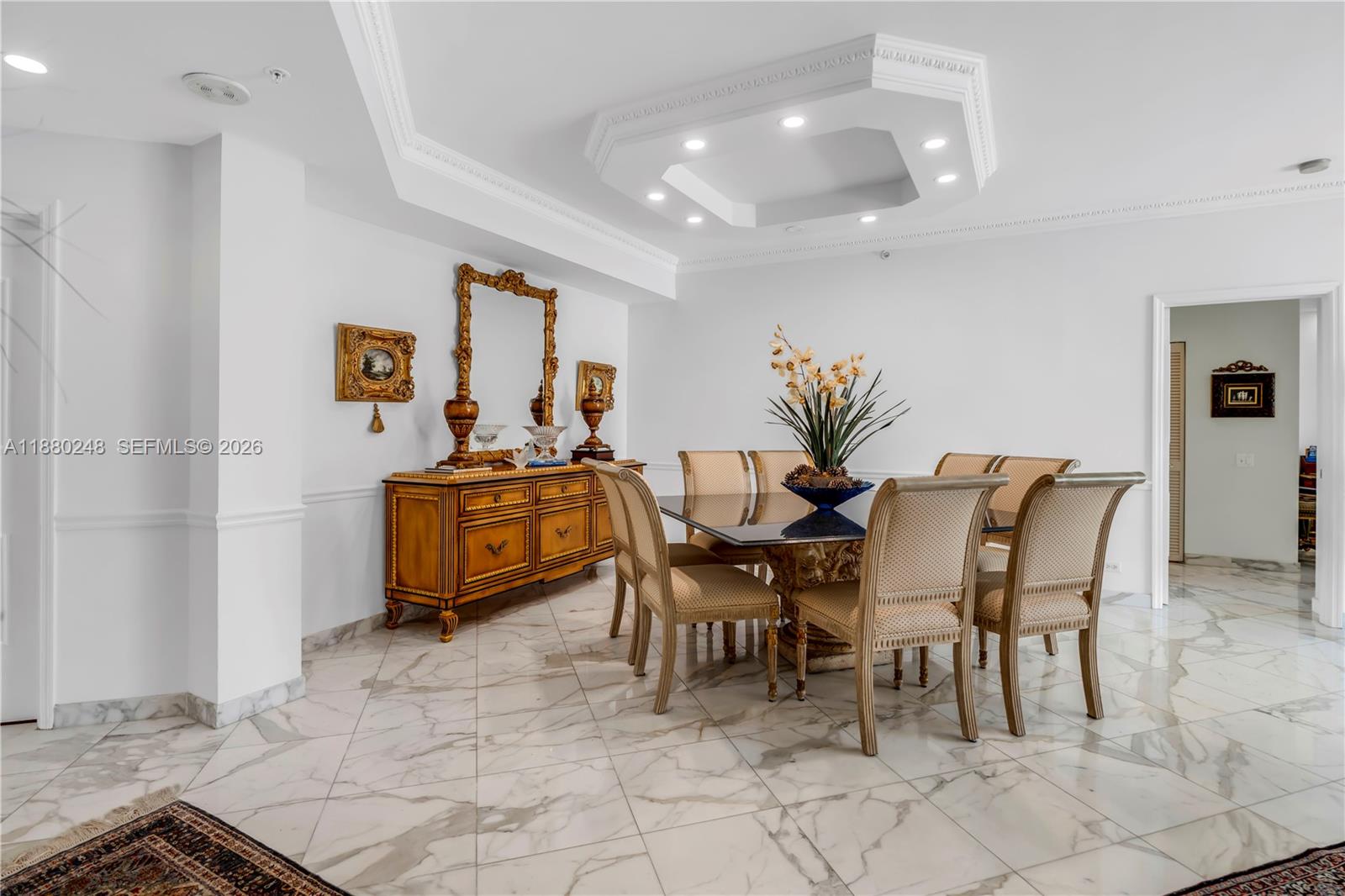 888 Brickell Key Drive, Unit 1807 Miami, FL 33131 - Photo 9 of 58 a view of a dining room with furniture